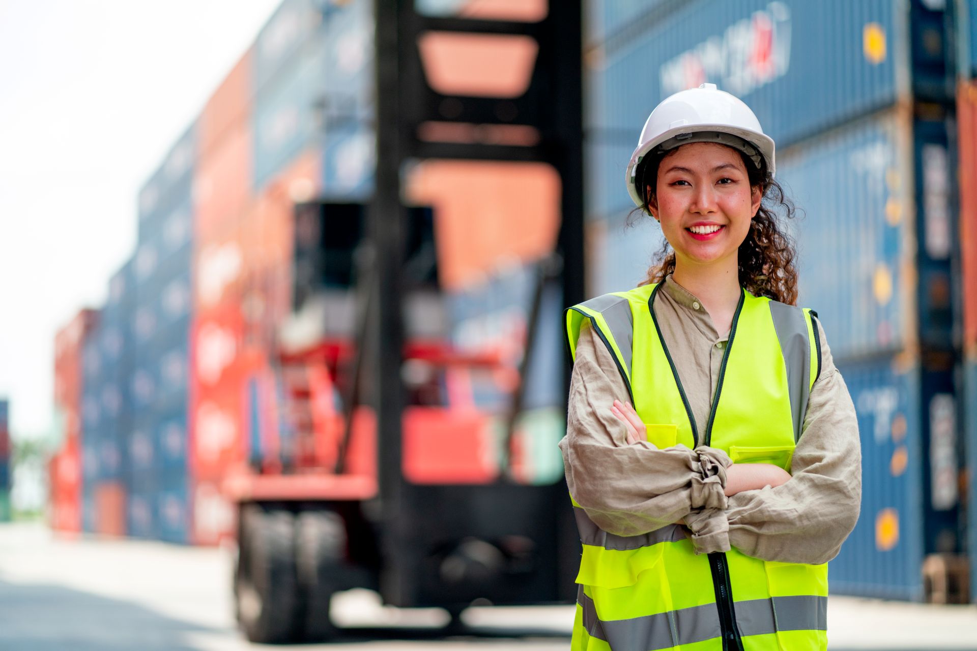 portrait-of-asian-cargo-container-worker-or-techni-2023-11-27-04-50-56-utc.jpg